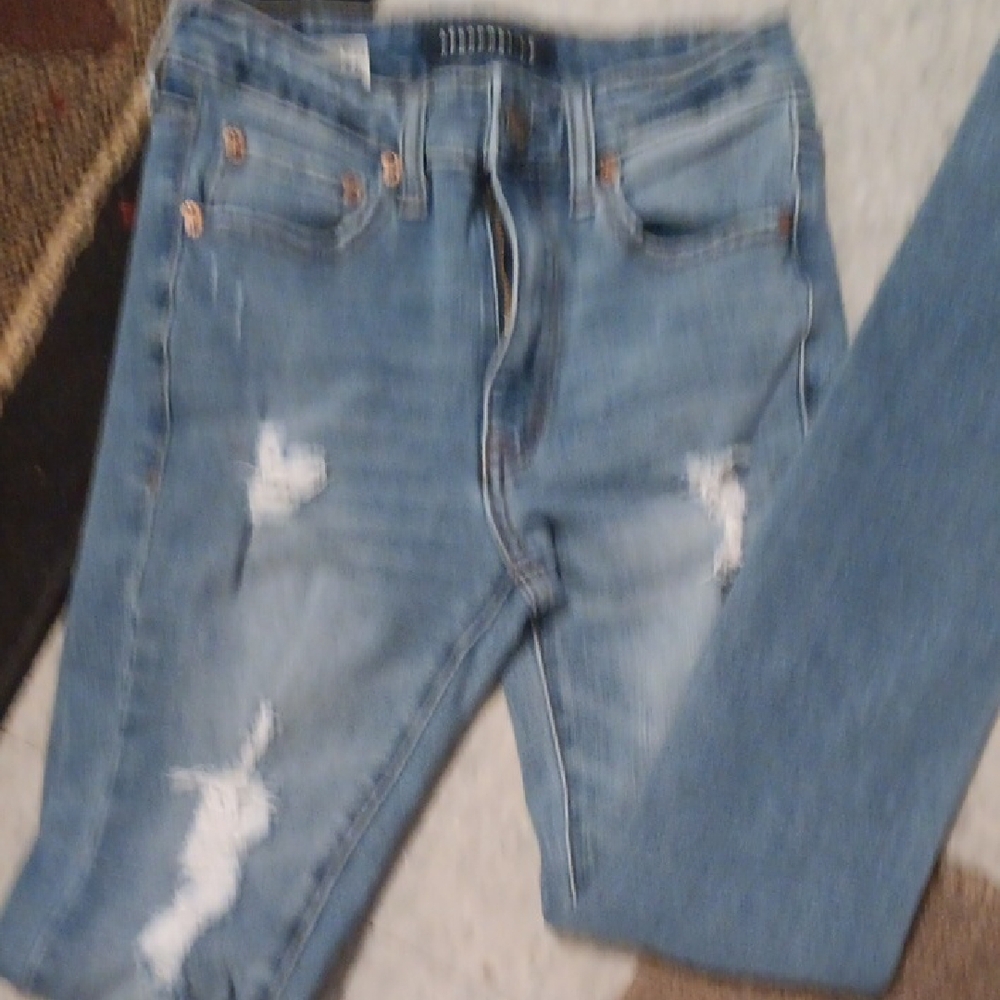 Distressed Blue Jeans
